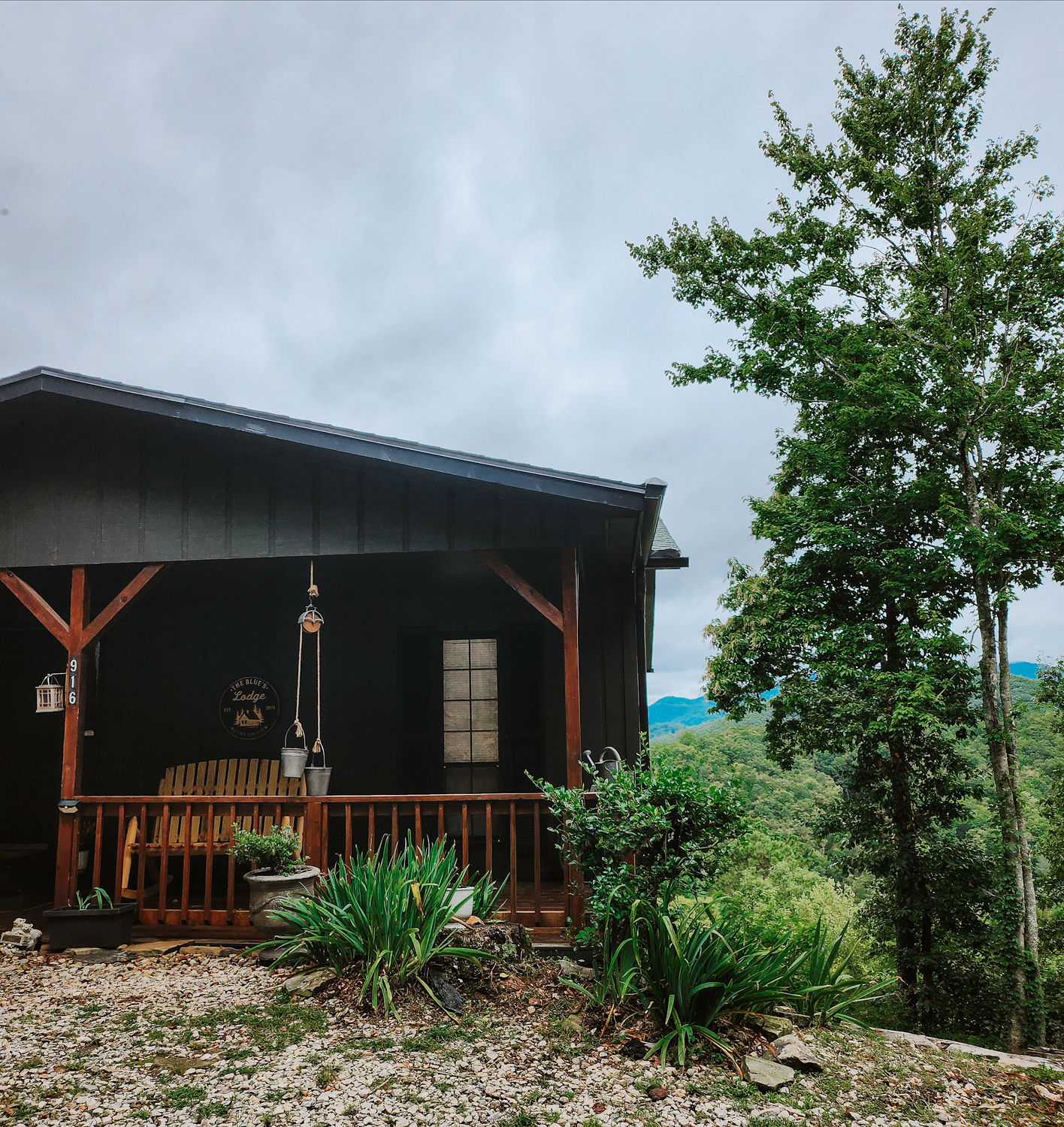 After image of the cabin exterior, when it's finally painted all black.