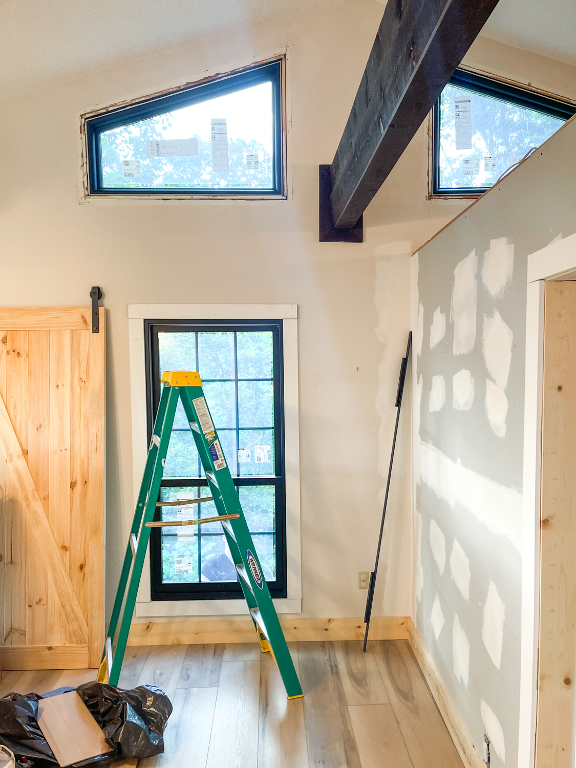 process of new wall and plank flooring 