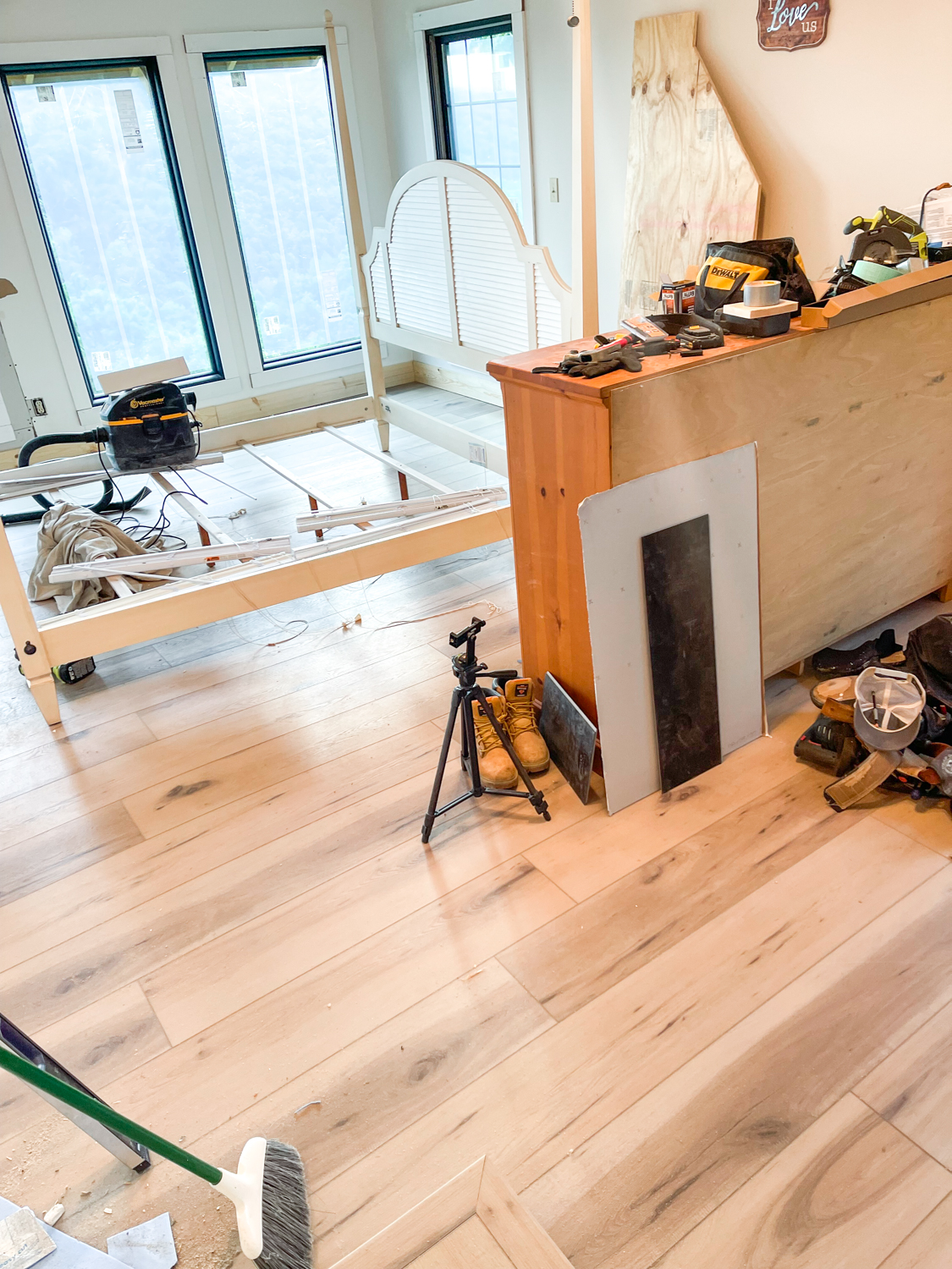 process of laying the luxury vinyl plank flooring
