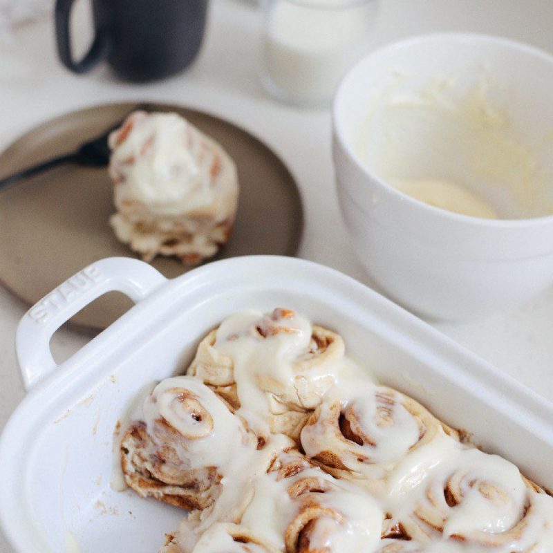 Easy bread machine cinnamon rolls dough. The best gooey sticky buns and clone of a Cinnabon roll icing! NO waiting overnight. Click for the recipe and how to video for fluffy cinnamon rolls homemade with a bread maker machine! Use all purpose flour or make them gluten free. Recipe from top Florida lifestyle blogger Tabitha Blue of Fresh Mommy Blog.