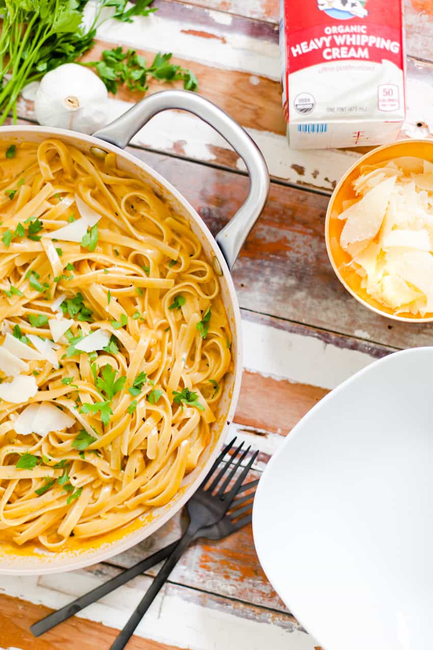 YUMMM is all I can say! I know why you're here: it starts with PUMPKIN… Pass on the BORING white alfredo and whip up this creamy pumpkin alfredo dish that's perfect fall dinner and easy enough for a weeknight meal!