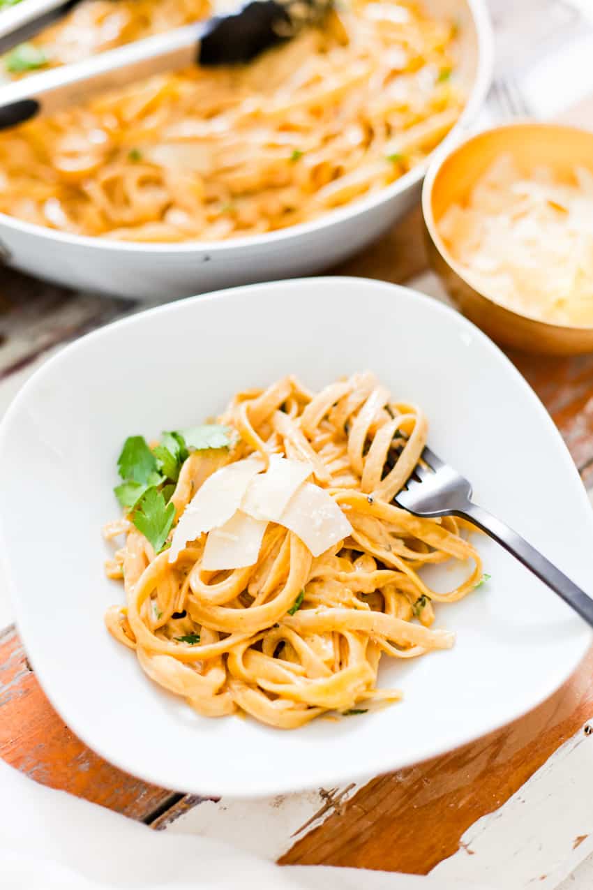 YUMMM is all I can say! I know why you're here: it starts with PUMPKIN… Pass on the BORING white alfredo and whip up this creamy pumpkin alfredo dish that's perfect fall dinner and easy enough for a weeknight meal!