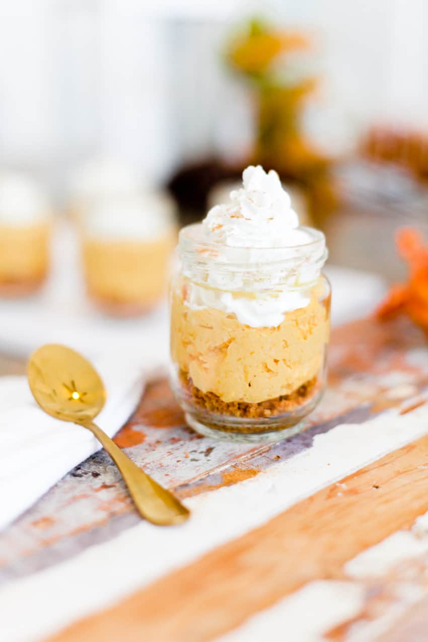 The best No Bake Pumpkin Cheesecake combines some of the favorite flavors of fall! Serve it in jars for an easy individual serving! Perfect for desserts, parties, fall events and more.