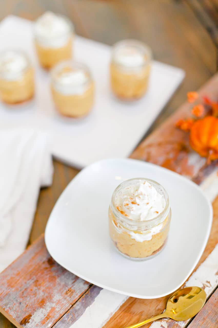 The best No Bake Pumpkin Cheesecake combines some of the favorite flavors of fall! Serve this pumpkin dessert jar for an easy individual serving! Perfect for desserts, parties, fall events and more.