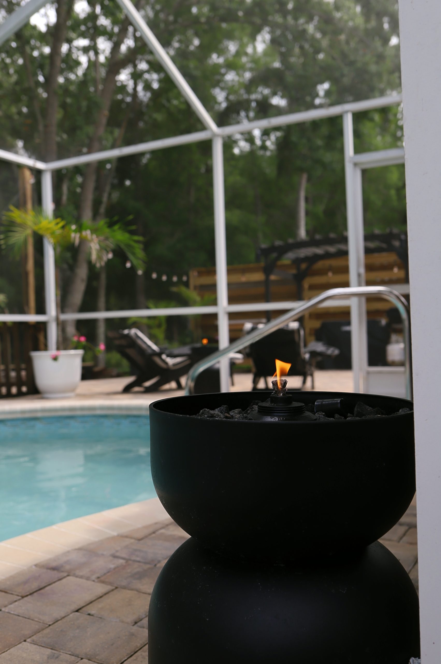 Need a quick outdoor DIY project? These DIY fire bowls (aka fire urns) were exactly what our backyard needed. Super easy, budget-friendly, and they give off the dreamiest glow. Watch how we made them, then head to the blog for all the details!